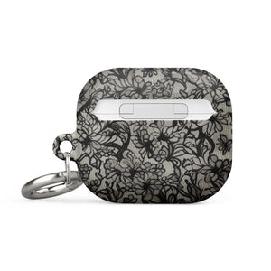 Omerta Floral for AirPods Gen 3 with a black floral lace pattern on a white background, featuring an impact-absorbing material and a metal keyring attachment. The words "STATEMENT CASES" are printed at the bottom.