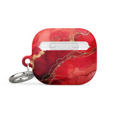 A red marbled Scarlet Marble for AirPods Gen 3 protection case with gold streaks and a keyring attachment on the side. The case, made from premium impact-absorbing material, has a glossy finish and is branded with "Statement Cases" in white text at the bottom.