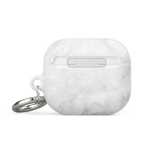 A white, marble-patterned Marble Dreams for AirPods Gen 3 with a metal carabiner attached on the right side for convenience. Made from impact-absorbing material, the case also features "Statement Cases" printed in white at the bottom.