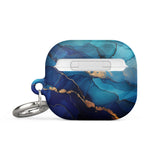 The Midnight Wave Marble for AirPods Gen 3 by Statement Cases is a stylish, impact-absorbing case that features a vibrant blue and gold marbled design with "Statement Cases" printed on the front. It also comes with a sturdy metal carabiner for easy attachment.