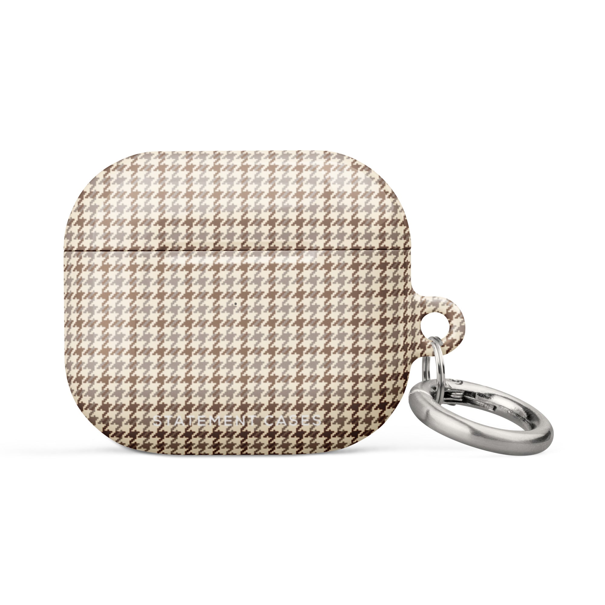 This Classic Houndstooth for AirPods Gen 3 case by Statement Cases, meticulously crafted with a beige and brown houndstooth pattern, is attached to a sturdy metal carabiner for easy access. Featuring a compact, rectangular design with rounded edges and premium impact-absorbing material, it ensures both style and utmost protection.