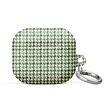 A green and white houndstooth-patterned Elegance Houndstooth for AirPods Gen 3 from Statement Cases with an impact-absorbing design features a sleek, polished look and includes a small metal carabiner attached to the side.