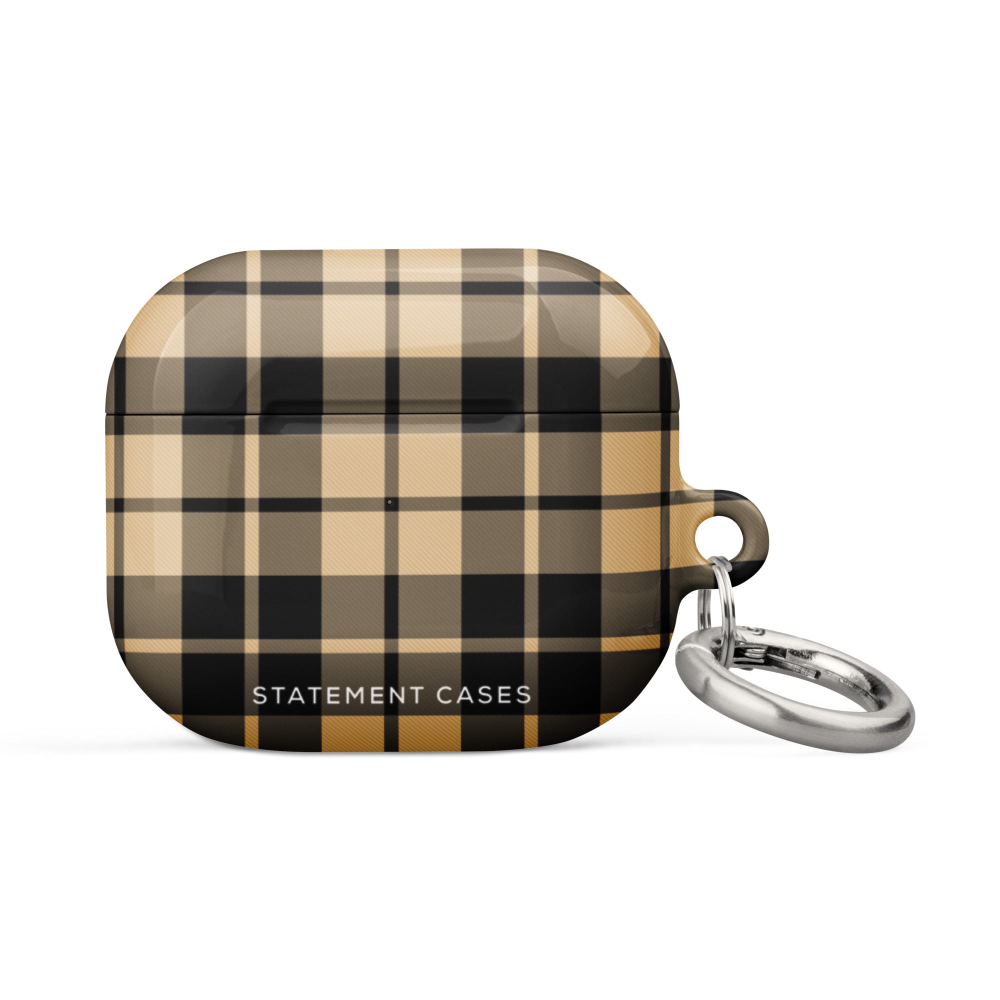 A plaid-patterned, impact-absorbing AirPods case in shades of beige, black, and brown. The Rich Espresso Tartan for AirPods Gen 3 by Statement Cases features a silver metal carabiner attached to its side and the phrase "STATEMENT CASES" printed in white at the bottom.