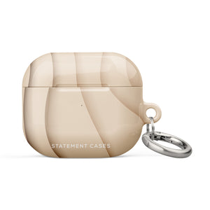 A beige and cream Sandy Serenity for AirPods Gen 3 case with a glossy finish and abstract pattern. The case has "Statement Cases" written in white on the front and features an impact-absorbing design with a metal carabiner attached to the side.