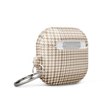 This Classic Houndstooth for AirPods Gen 3 case by Statement Cases, meticulously crafted with a beige and brown houndstooth pattern, is attached to a sturdy metal carabiner for easy access. Featuring a compact, rectangular design with rounded edges and premium impact-absorbing material, it ensures both style and utmost protection.
