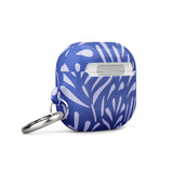 The "Mariposa Azul for AirPods Gen 3" from Statement Cases is a blue protective case for wireless earbuds, featuring an abstract white leaf pattern design. The case has a glossy finish and includes a sturdy metal carabiner attachment on its side. Crafted from impact-absorbing material, the text "STATEMENT CASES" is printed on the front.