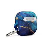 The Midnight Wave Marble for AirPods Gen 3 by Statement Cases is a stylish, impact-absorbing case that features a vibrant blue and gold marbled design with "Statement Cases" printed on the front. It also comes with a sturdy metal carabiner for easy attachment.