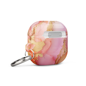 A Gold Blush Marble case for AirPods Gen 3, featuring a pink and gold marble pattern with a silver keychain attached to the side. Made from premium material, this impact-absorbing case showcases the brand name "Statement Cases" printed on the front in white.