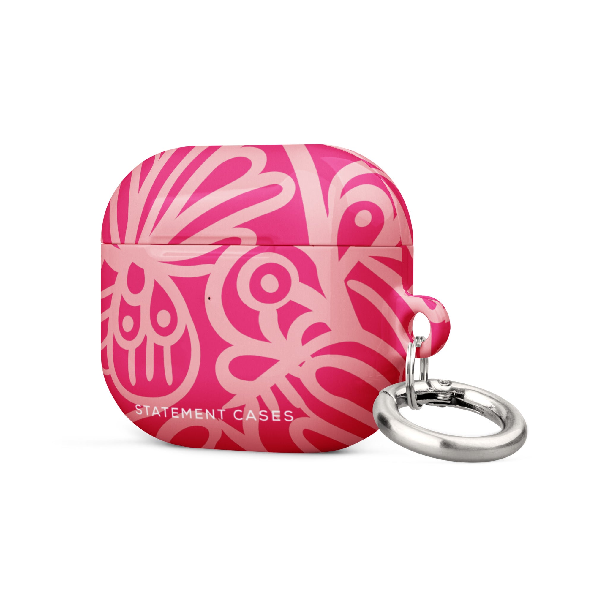 Introducing the Zafiro Rosa for AirPods Gen 3 by Statement Cases: a pink and red abstract-patterned protective case made from impact-absorbing material, featuring a small silver keychain attached to its side. The text "STATEMENT CASES" is prominently printed on the front near the bottom.