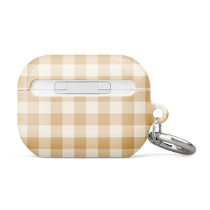 A rectangular Gingham Grace for AirPods Pro Gen 2 case from Statement Cases with rounded edges, featuring a beige and white checkered pattern. The case has a small metal carabiner attached to its side for easy carrying, and the words “Statement Cases” are printed in white near the bottom.