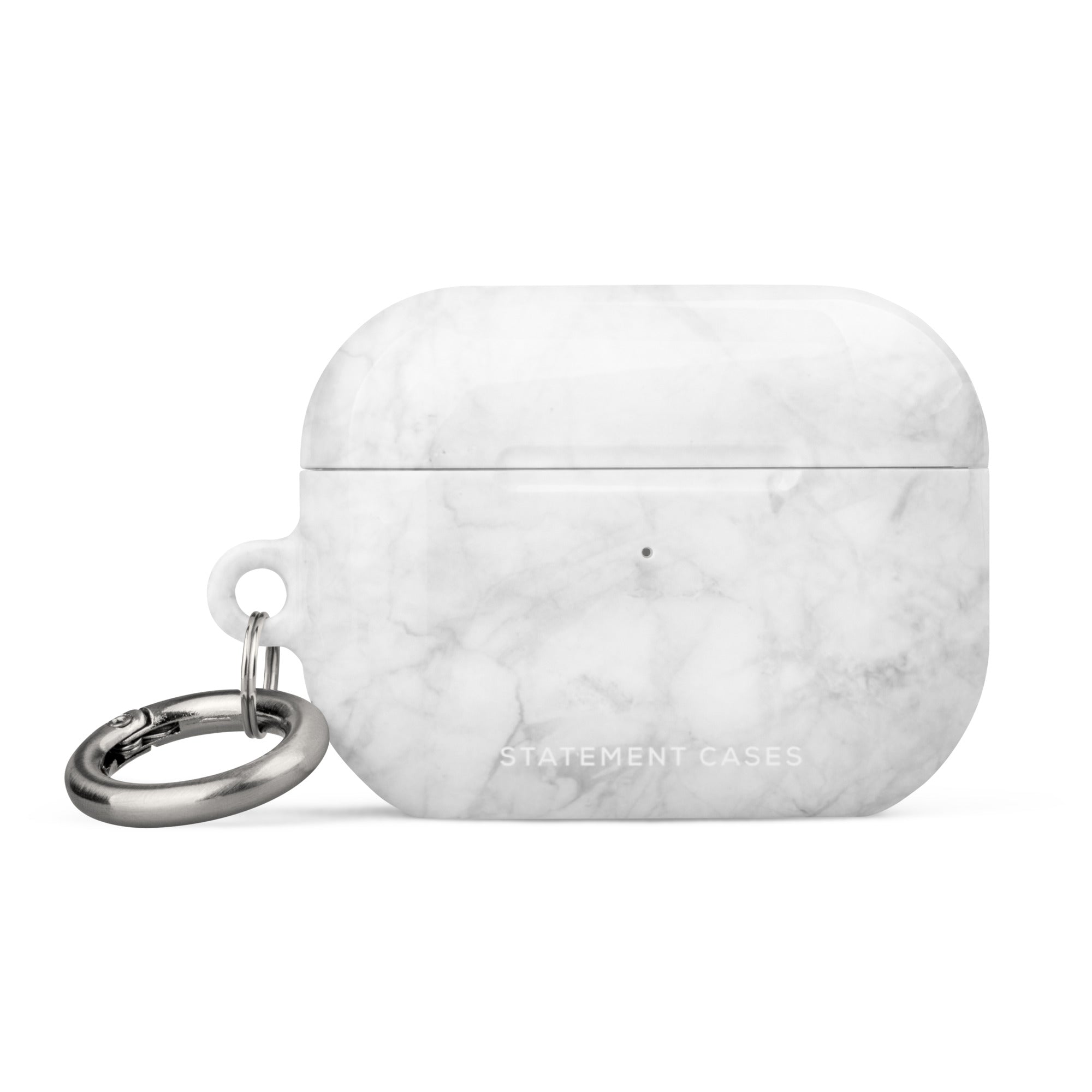A white, marble-patterned protective Marble Dreams for AirPods Pro Gen 2 case by Statement Cases with a metallic carabiner attached on the left side. This impact-absorbing case has "Statement Cases" written on the front, ensuring both style and safety for your wireless earbuds.