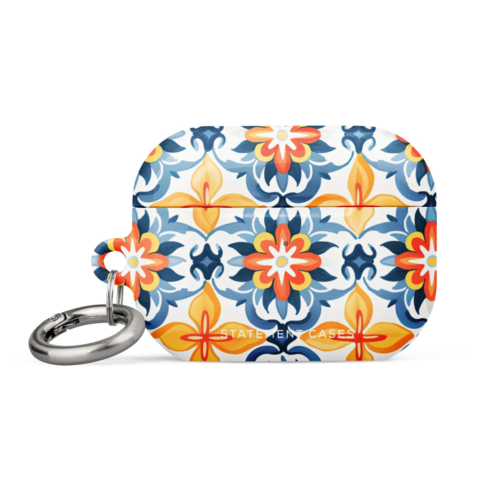 Introducing the Mediterranean Bloom for AirPods Pro Gen 2 by Statement Cases: a vibrant case adorned with a colorful, floral-like geometric pattern in blue, orange, and yellow hues. This impact-absorbing case features a metal carabiner attachment on the side, allowing it to be easily clipped to other items. The intricate design covers the entire surface of the case.