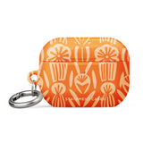 A Savannah Ardiente for AirPods Pro Gen 2 case by Statement Cases, featuring a floral and geometric pattern in lighter orange hues. The phrase "STATEMENT CASES" is printed near the bottom. A metal carabiner is attached to the side of the impact-absorbing case.