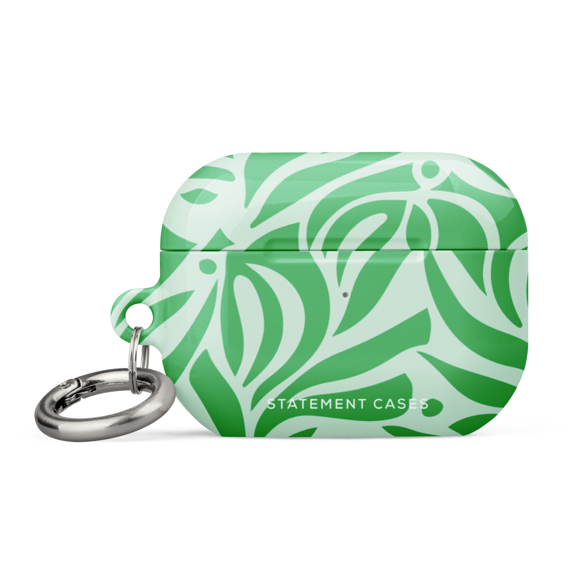 Introducing the "Selva Verde for AirPods Pro Gen 2" by Statement Cases: a green and white leaf-patterned, impact-absorbing case for your AirPods®, featuring a metal carabiner and the brand's name prominently on the front.