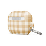 A rectangular Gingham Grace for AirPods Pro Gen 2 case from Statement Cases with rounded edges, featuring a beige and white checkered pattern. The case has a small metal carabiner attached to its side for easy carrying, and the words “Statement Cases” are printed in white near the bottom.