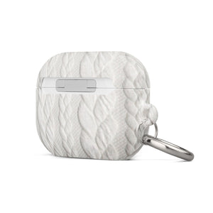A white Cozy Knit Bliss for AirPods Pro Gen 2 case from Statement Cases with a cable knit texture design on the surface. The case features a metal carabiner attachment on the left side for added convenience. The text "STATEMENT CASES" is printed at the bottom center of the case, offering stylish impact-absorbing protection.