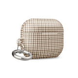 A houndstooth patterned AirPods® case with a metal carabiner attachment on the left side. The case boasts a beige and brown checkered design and features premium impact-absorbing materials for added protection. Introducing the Classic Houndstooth for AirPods Pro Gen 2 by Statement Cases.