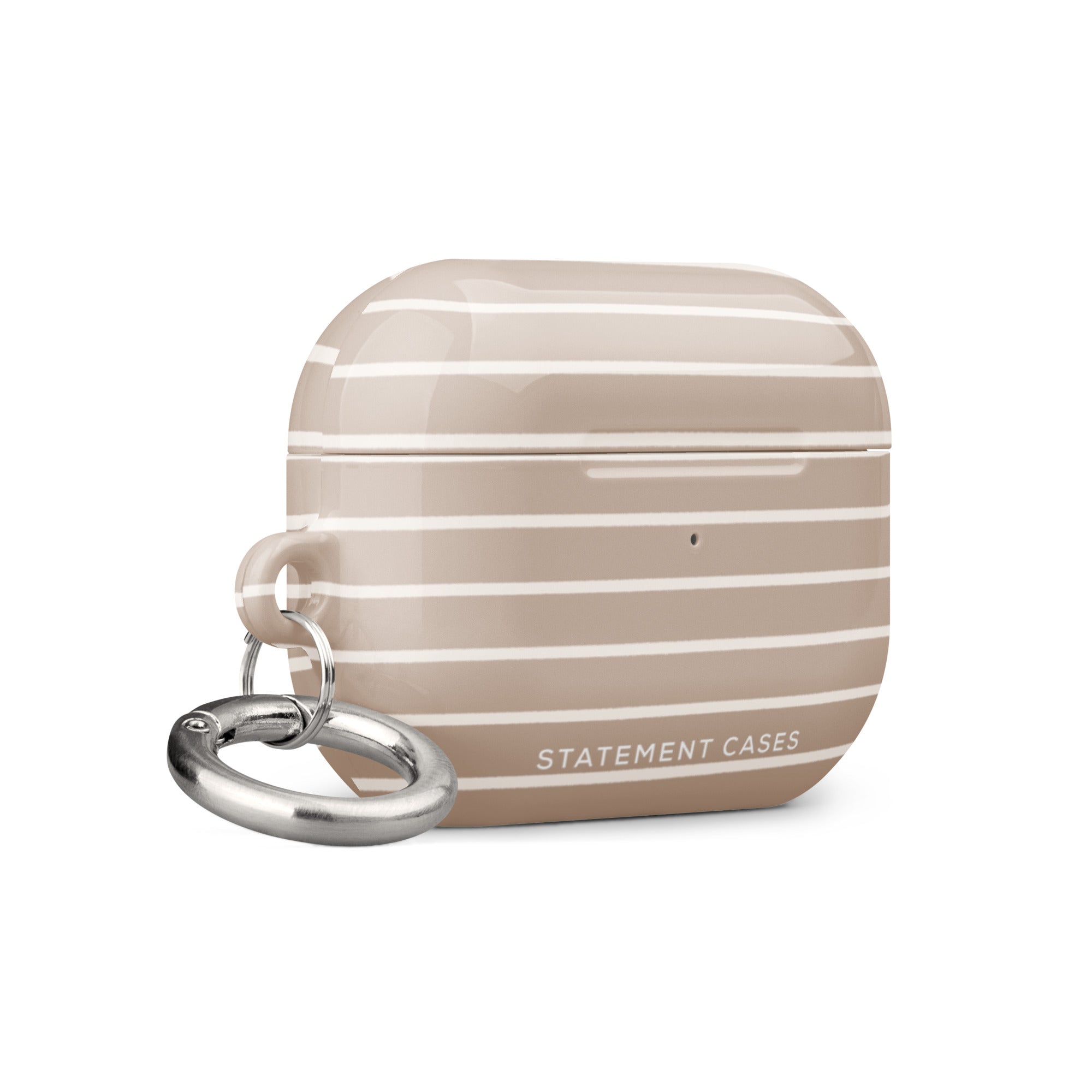 A beige Au Naturale for AirPods Pro Gen 2 case with horizontal white stripes and a small keychain loop on the side. Crafted from impact-absorbing material, the case also features a metal carabiner for added convenience. The text "Statement Cases" appears near the bottom. The case has a smooth, glossy finish.