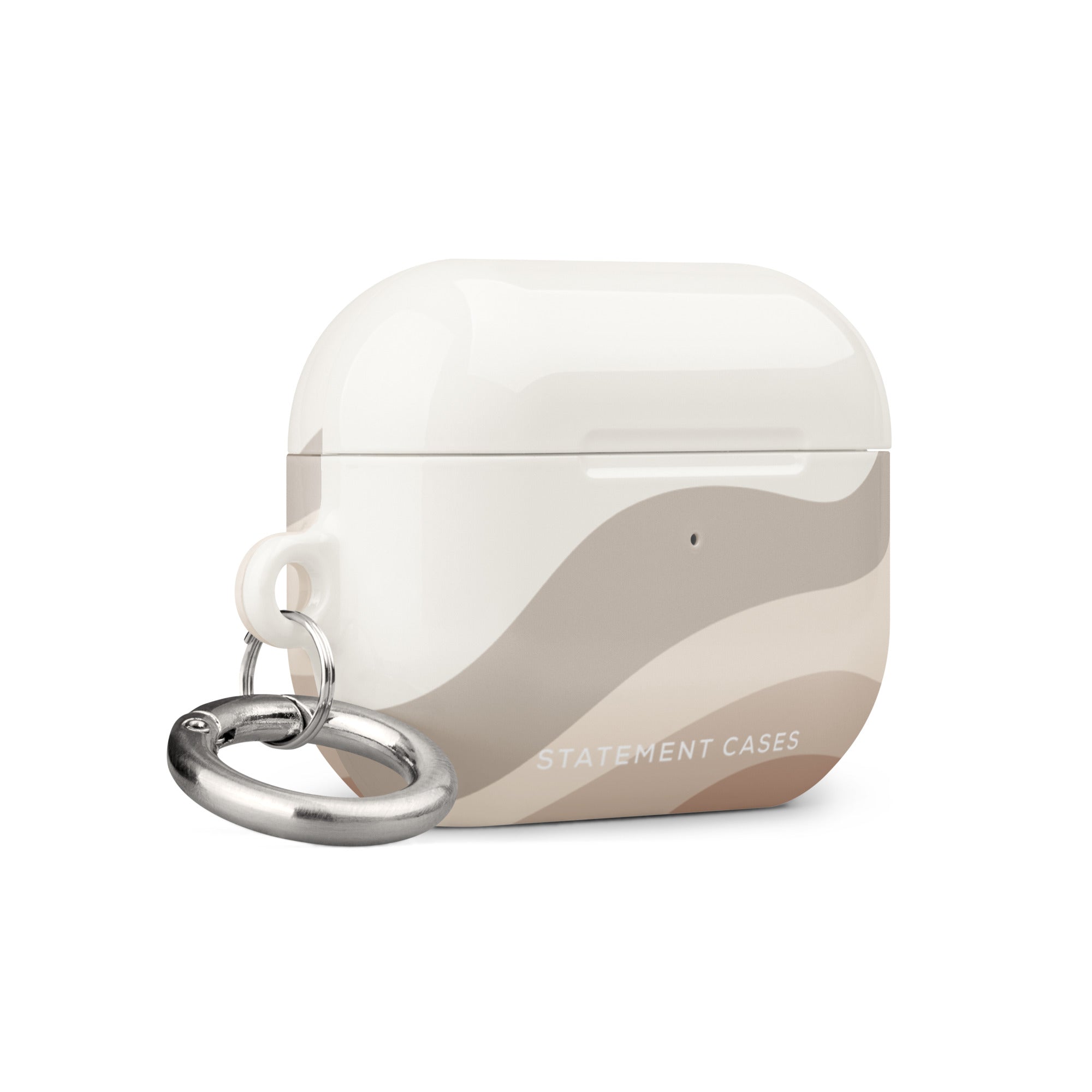 A white Serene Sands for AirPods Pro Gen 2 case with a beige, wavy pattern on the front. The case, made from premium impact-absorbing material, has a silver keyring attached to the side. The text "Statement Cases" is printed at the bottom front of the case.