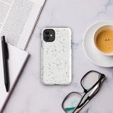 Protective Terrazzo Chic for iPhone by Statement Cases with a white terrazzo-patterned design, featuring grey and beige speckles on its surface. This sleek case covers the back and sides of your iPhone 15 Pro Max.