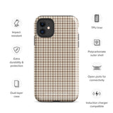 A smartphone with a brown and beige houndstooth-patterned case is shown from the back. The impact-resistant, dual-layered Classic Houndstooth for iPhone by Statement Cases protects the phone's body and leaves openings for the camera lenses and flash. The hues give the case a stylish and sophisticated appearance.