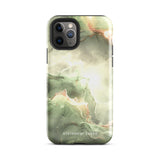 A Sleek Sage for iPhone with a marble-patterned case in shades of green, white, and gold. The protective case is branded with "Statement Cases" written at the bottom. Compatible with the iPhone 15 Pro Max, the phone's camera lens is prominent in the upper left corner.