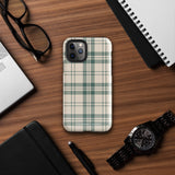 A smartphone with a beige and green plaid-patterned, impact-resistant polycarbonate case is shown. The phone’s rear camera lenses are prominently visible at the top left. The durable phone case features the words “Statement Cases” printed in small text at the bottom center. This is the Elegant Plaid for iPhone.