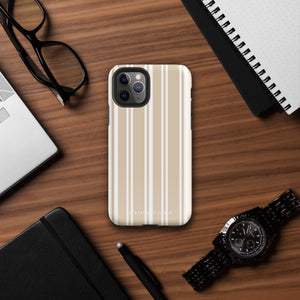 A beige and white striped, impact-resistant phone case for a smartphone. The Estate Stripe for iPhone features vertical stripes and dual-layer protection, designed to fit a phone with multiple camera lenses. The brand name "Statement Cases" is subtly printed at the bottom.