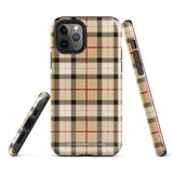 A Neutral Heritage Tartan for iPhone by Statement Cases with a plaid-patterned, impact-resistant polycarbonate case featuring beige, black, white, and red stripes. The durable phone case has the text "STATEMENT CASES" written at the bottom. The phone boasts a triple camera setup with an additional sensor and flash.