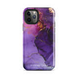 A Golden Orchid Marble smartphone case featuring a vibrant abstract design in shades of purple, accented with streaks of gold and black lines creating a marbled effect. The impact-resistant polycarbonate and TPU inner liner ensure dual-layer protection. The text "Statement Cases" is printed in white at the bottom of the case.