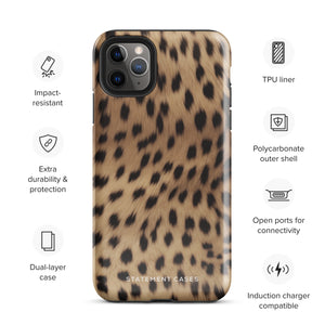 A smartphone with a leopard print case featuring black spots on a beige background is shown. The Daring Cheetah Fur for iPhone, designed for the iPhone 15 Pro Max, is labeled "Statement Cases" near the bottom. The phone's camera lenses and flash are visible at the top left corner.