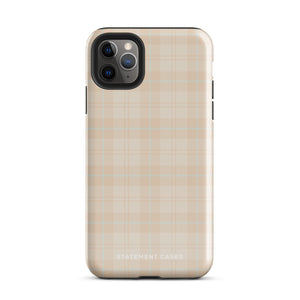 A smartphone with a plaid design case is displayed. The durable phone case features a beige and light brown checked pattern. The phone's camera lenses are visible at the top left corner. With dual-layer protection, the bottom of the impact-resistant polycarbonate Sophisticated Plaid for iPhone case reads "Statement Cases" in white.