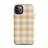 A Gingham Grace for iPhone by Statement Cases is covered with a protective case featuring a beige and white checkered pattern. The case's design includes a matte finish, dual-layer protection with an impact-resistant polycarbonate exterior and TPU lining, and the text "Statement Cases" printed near the bottom. The phone's cameras and buttons are visible.