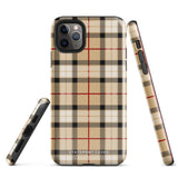 A Neutral Heritage Tartan for iPhone by Statement Cases with a plaid-patterned, impact-resistant polycarbonate case featuring beige, black, white, and red stripes. The durable phone case has the text "STATEMENT CASES" written at the bottom. The phone boasts a triple camera setup with an additional sensor and flash.