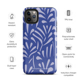 An iPhone encased in the "Mariposa Azul" by Statement Cases, featuring a blue design with an abstract white leaf pattern. The case combines curved and pointed shapes and provides dual-layer protection with TPU lining and impact-resistant polycarbonate. Camera lenses and other top elements remain unobstructed, and "Statement Cases" is inscribed at the bottom.