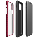 A protective iPhone case with a maroon background and a repeating pattern of small eyeglasses. Designed for the iPhone 15 Pro Max, the camera and buttons of the phone are visible. The bottom of the case features the text "Rockstar Red for iPhone" in white from Statement Cases.