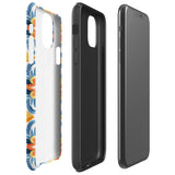 Statement Cases' Mediterranean Bloom for iPhone is showcased, featuring an intricate, colorful pattern. The design includes blue, yellow, and orange floral shapes in a symmetrical arrangement on a light blue background. This durable phone case provides dual-layer protection and is constructed from impact-resistant polycarbonate to safeguard your device.