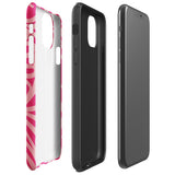 Introducing the Zafiro Rosa for iPhone by Statement Cases: a smartphone case featuring abstract floral and leaf patterns in various shades of pink. This dual-layer protection case combines an impact-resistant polycarbonate exterior with a TPU inner liner to ensure durability. The design showcases the brand name "Statement Cases" at the bottom, with precise cutouts revealing the phone’s camera lenses at the top left corner.