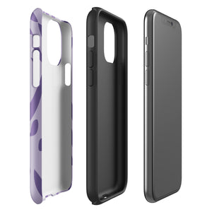 The Luna Morada for iPhone by Statement Cases is a durable phone case with a purple protective exterior featuring abstract dark purple and lavender patterns. The design includes geometric shapes and curves, giving it a modern artistic look. Made from impact-resistant polycarbonate, the lower part of the case prominently displays "STATEMENT CASES.