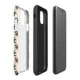 A beige protective iPhone case with an interlocking black "SC" pattern displayed across its back. Custom-tailored for the iPhone 15 Pro Max, the Heritage Monogram for iPhone by Statement Cases features cutouts for the camera lenses and buttons. The design is sleek and minimalistic.