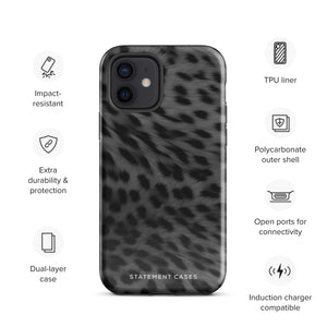 A protective iPhone case with a black and grey leopard print design. The words "Statement Cases" are printed in white near the bottom of the case. The Nocturnal Hunter Fur for iPhone 15 Pro Max is viewed from the back, showcasing its sleek style.