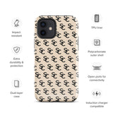 A beige protective iPhone case with an interlocking black "SC" pattern displayed across its back. Custom-tailored for the iPhone 15 Pro Max, the Heritage Monogram for iPhone by Statement Cases features cutouts for the camera lenses and buttons. The design is sleek and minimalistic.