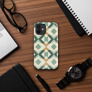 A Smartphone with a durable Old World Mosaic for iPhone case by Statement Cases showcasing a geometric pattern in shades of green, beige, and white. The symmetrical, angular designs create an almost star-like appearance. The impact-resistant polycarbonate construction ensures protection while the camera lenses remain visible at the top left corner.