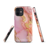 The Gold Blush Marble for iPhone showcases a glossy, marble-patterned case in shades of pink and gold. The decorative design features swirling patterns, seamlessly blending the colors. Crafted with impact-resistant polycarbonate for superior phone protection, "Statement Cases" is written in white at the bottom.