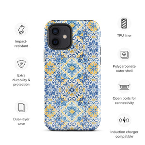 The Blue Mirage for iPhone by Statement Cases features a dual-layered, impact-resistant polycarbonate exterior with a TPU inner liner. Inspired by traditional Portuguese tiles, the blue and yellow patterned case boasts an intricate design of floral and geometric motifs. With its elegant and colorful appearance, the phone's camera is visible at the top left of the case.