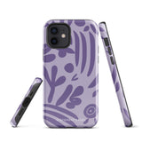 The Luna Morada for iPhone by Statement Cases is a durable phone case with a purple protective exterior featuring abstract dark purple and lavender patterns. The design includes geometric shapes and curves, giving it a modern artistic look. Made from impact-resistant polycarbonate, the lower part of the case prominently displays "STATEMENT CASES.