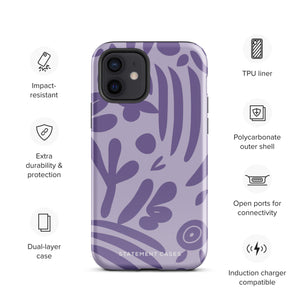 The Luna Morada for iPhone by Statement Cases is a durable phone case with a purple protective exterior featuring abstract dark purple and lavender patterns. The design includes geometric shapes and curves, giving it a modern artistic look. Made from impact-resistant polycarbonate, the lower part of the case prominently displays "STATEMENT CASES.