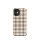 A smartphone with a brown and beige houndstooth-patterned case is shown from the back. The impact-resistant, dual-layered Classic Houndstooth for iPhone by Statement Cases protects the phone's body and leaves openings for the camera lenses and flash. The hues give the case a stylish and sophisticated appearance.