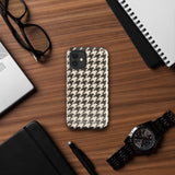 A Timeless Houndstooth for iPhone with a dual-camera system is encased in an impact-resistant polycarbonate, houndstooth-patterned case. The black and beige design features the brand name "Statement Cases" printed at the bottom, ensuring both style and dual-layer protection for your device.