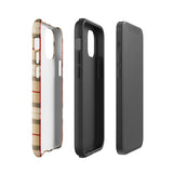 A Neutral Heritage Tartan for iPhone by Statement Cases with a plaid-patterned, impact-resistant polycarbonate case featuring beige, black, white, and red stripes. The durable phone case has the text "STATEMENT CASES" written at the bottom. The phone boasts a triple camera setup with an additional sensor and flash.